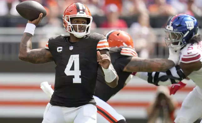 Cleveland Browns quarterback Deshaun Watson (4) passes against the New York Giants during the first half of an NFL football game, Sunday, Sept. 22, 2024 in Cleveland. (AP Photo/Sue Ogrocki)