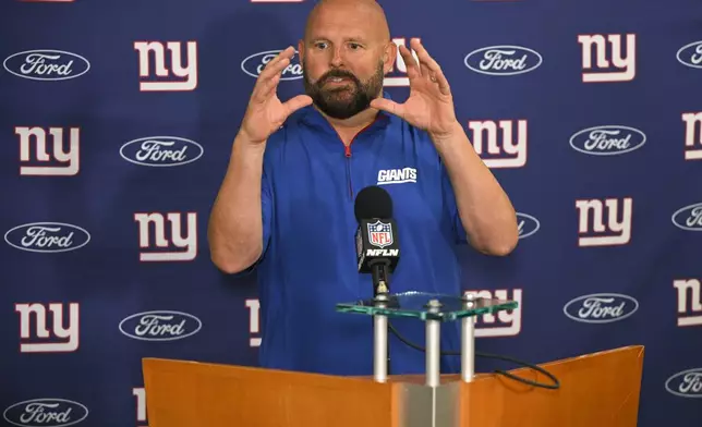 New York Giants head coach Brian Daboll speaks during a news conference following an NFL football game against the Cleveland Browns, Sunday, Sept. 22, 2024, in Cleveland. (AP Photo/David Richard)