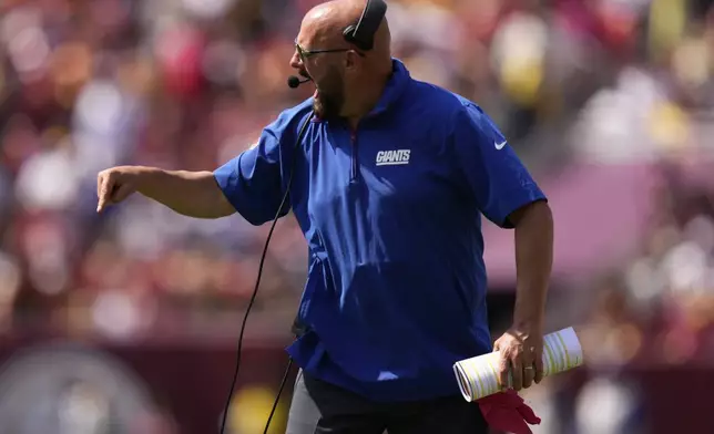 New York Giants head coach Brian Daboll reacts to a call during the first half of an NFL football game against the Washington Commanders in Landover, Md., Sunday, Sept. 15, 2024. (AP Photo/Matt Slocum)