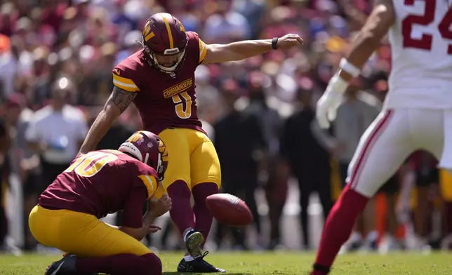 Washington Commanders place kicker Austin Seibert (3) kicks a field goal against the New York Giants during the first half of an NFL football game in Landover, Md., Sunday, Sept. 15, 2024. (AP Photo/Matt Slocum)