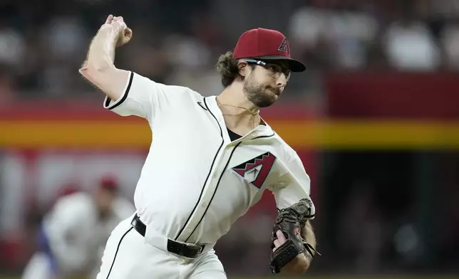 Arizona Diamondbacks starting pitcher Zac Gallen throws against the San Francisco Giants during the first inning of a baseball game Wednesday, Sept. 25, 2024, in Phoenix. (AP Photo/Ross D. Franklin)