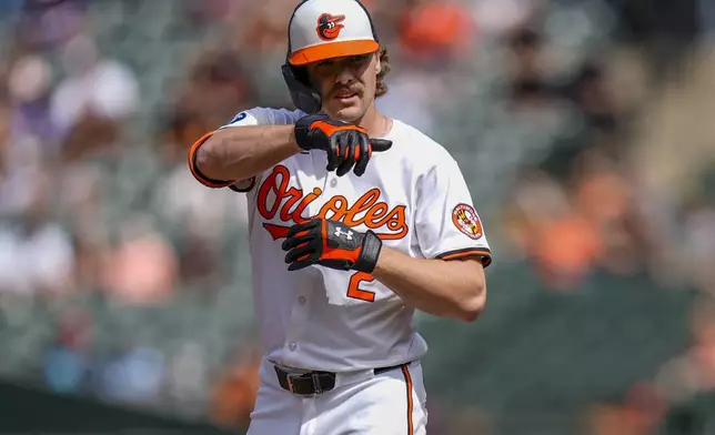 Baltimore Orioles' Gunnar Henderson celebrates after hitting a single during the first inning of a baseball game against the San Francisco Giants, Thursday, Sept. 19, 2024, in Baltimore. (AP Photo/Stephanie Scarbrough)