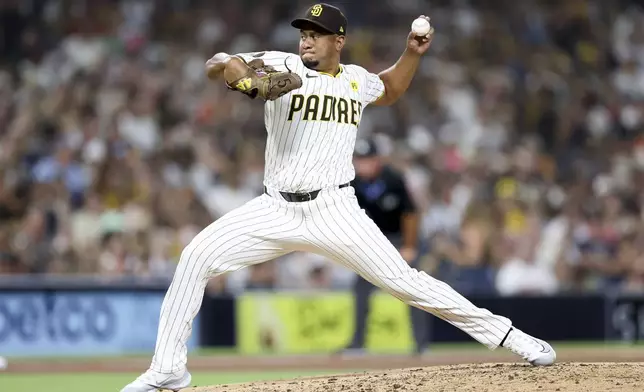 San Diego Padres relief pitcher Wandy Peralta throws during the seventh inning of a baseball game against the San Francisco Giants, Saturday, Sept. 7, 2024, in San Diego. (AP Photo/Ryan Sun)