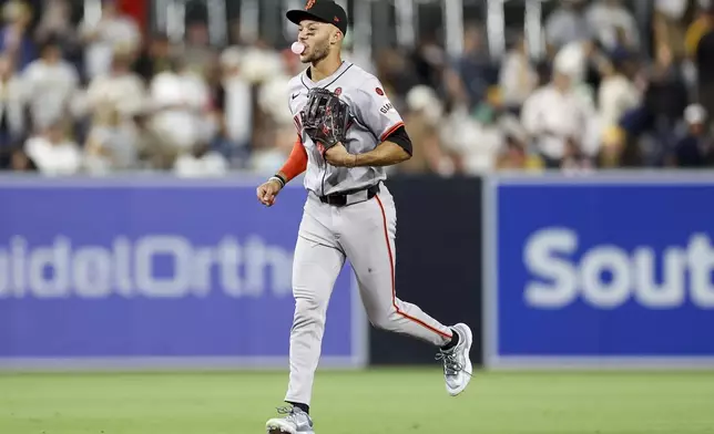 San Francisco Giants center fielder Grant McCray leaves the field after his team's win over the San Diego Padres in a baseball game Saturday, Sept. 7, 2024, in San Diego. (AP Photo/Ryan Sun)