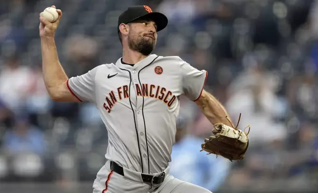 San Francisco Giants relief pitcher Tristan Beck throws during the ninth inning of a baseball game against the Kansas City Royals Saturday, Sept. 21, 2024, in Kansas City, Mo. The Giants won 9-0. (AP Photo/Charlie Riedel)