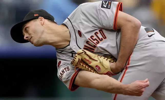 San Francisco Giants relief pitcher Tyler Rogers throws during the eighth inning of a baseball game against the Kansas City Royals Sunday, Sept. 22, 2024, in Kansas City, Mo. (AP Photo/Charlie Riedel)