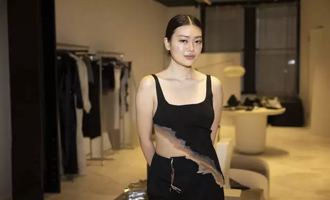 Singapore designer Grace Ling poses in her showroom where she displays her 3D printed designs on Friday, Sept. 13, 2024, in New York. Ling, a CFDA/Vogue Fashion Fund finalist, showcased her latest collection at New York Fashion Week. (Photo by Matt Licari/Invision/AP)