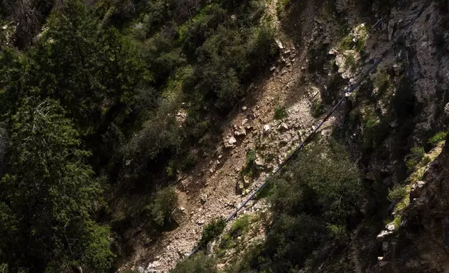 A recently replaced section of pipeline that brings water to the South Rim of Grand Canyon National Park is seen below Bright Angel Lodge in Arizona, Friday, Aug. 30, 2024. (AP Photo/Ty ONeil)