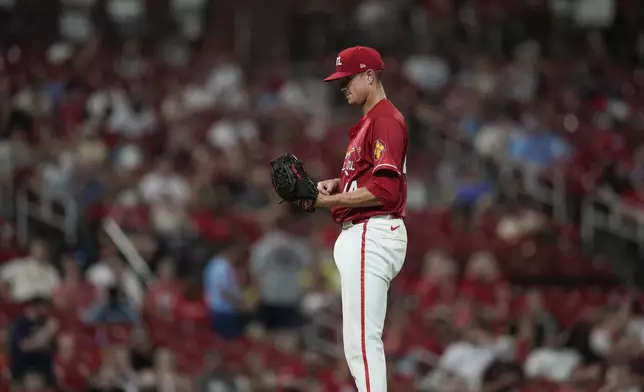 St. Louis Cardinals starting pitcher Kyle Gibson pauses on the mound after giving up a solo home run to Cleveland Guardians' Jose Ramirez during the fifth inning of a baseball game Friday, Sept. 20, 2024, in St. Louis. (AP Photo/Jeff Roberson)