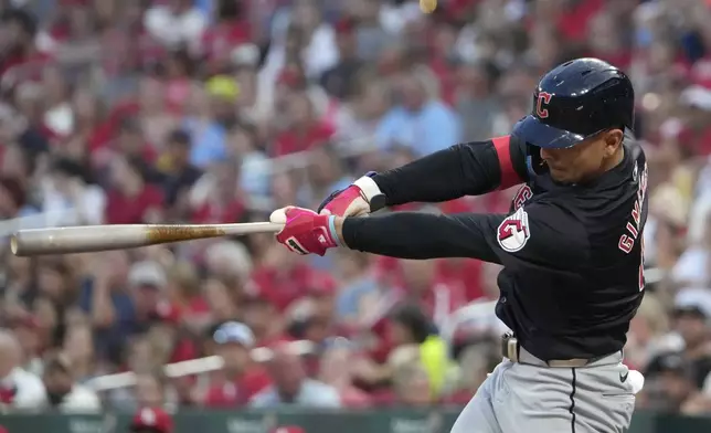 Cleveland Guardians' Andres Gimenez singles during the second inning of a baseball game against the St. Louis Cardinals Saturday, Sept. 21, 2024, in St. Louis. (AP Photo/Jeff Roberson)