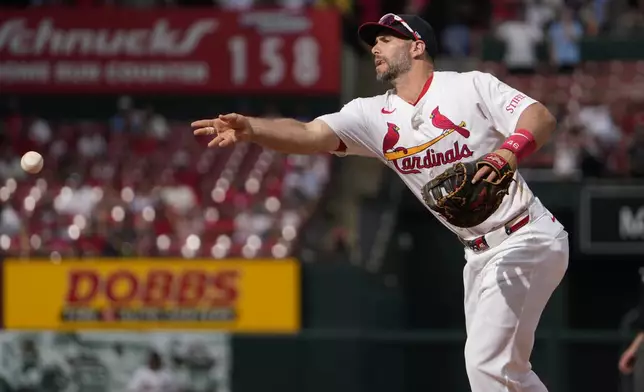 St. Louis Cardinals first baseman Paul Goldschmidt throws out Cleveland Guardians' Daniel Schneemann at first during the ninth inning of a baseball game Sunday, Sept. 22, 2024, in St. Louis. (AP Photo/Jeff Roberson)