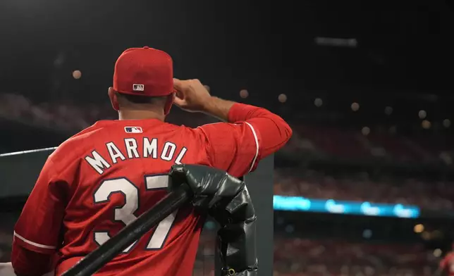 St. Louis Cardinals manager Oliver Marmol watches from the dugout during the seventh inning of a baseball game against the Cleveland Guardians Friday, Sept. 20, 2024, in St. Louis. (AP Photo/Jeff Roberson)