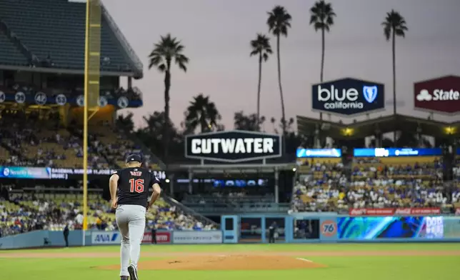 Cleveland Guardians starting pitcher Matthew Boyd runs to the mound during the first inning of a baseball game against the Los Angeles Dodgers in Los Angeles, Friday, Sept. 6, 2024. (AP Photo/Ashley Landis)