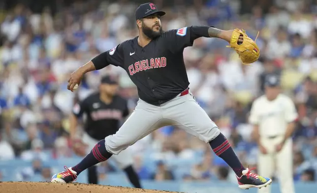 Cleveland Guardians relief pitcher Pedro Avila throws during the first inning of a baseball game against the Los Angeles Dodgers in Los Angeles, Saturday, Sept. 7, 2024. (AP Photo/Ashley Landis)