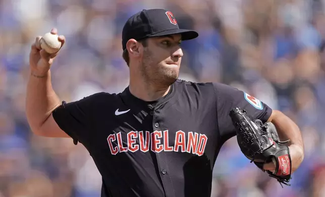 Cleveland Guardians starting pitcher Gavin Williams throws during the first inning of a baseball game against the Kansas City Royals Monday, Sept. 2, 2024, in Kansas City, Mo. (AP Photo/Charlie Riedel)