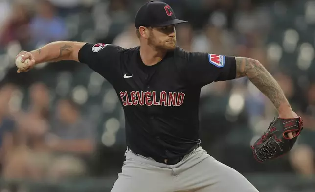 Cleveland Guardians starting pitcher Ben Lively throws during the first inning of a baseball game against the Chicago White Sox, Tuesday, Sept. 10, 2024, in Chicago. (AP Photo/Melissa Tamez)