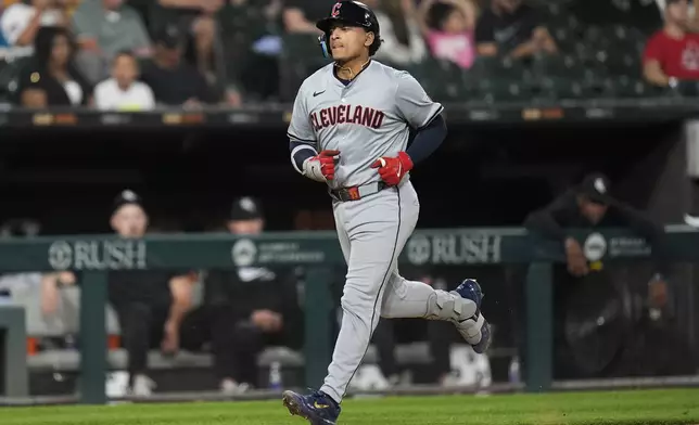 Cleveland Guardians' Bo Naylor runs the bases after hitting a home run during the fourth inning of a baseball game against the Chicago White Sox, Monday, Sept. 9, 2024, in Chicago. (AP Photo/Erin Hooley)