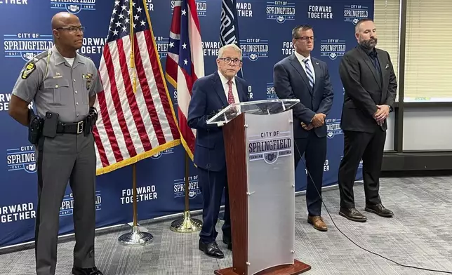 Republican Ohio Gov. Mike DeWine holds a news conference Monday, Sept. 16, 2024, at city hall in Springfield, Ohio, (AP Photo/Patrick Aftoora Orsagos)