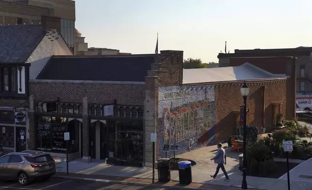 A man walks through Downtown Springfield, Ohio, Monday, Sept. 16, 2024. (AP Photo/Jessie Wardarski)