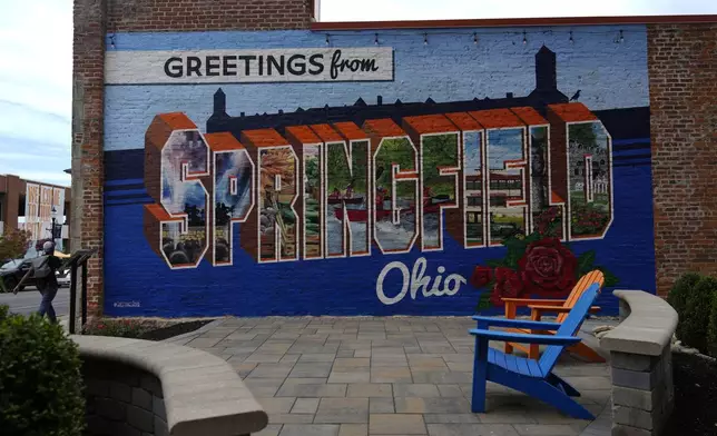 A mural that reads "Greetings from Springfield Ohio" is seen painted on an alley wall Tuesday, Sept. 17, 2024, in Springfield, Ohio. (AP Photo/Carolyn Kaster)