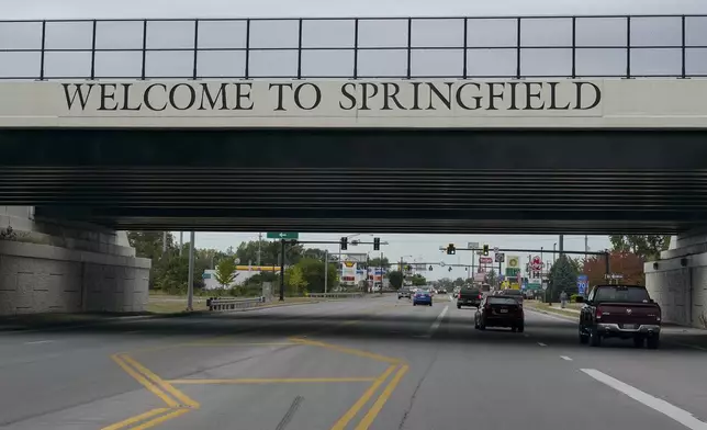 "Welcome To Springfield" is displayed on the Interstate 70 overpass, Tuesday, Sept. 17, 2024, in Springfield, Ohio. (AP Photo/Carolyn Kaster)