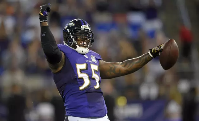 FILE - In this Aug. 29, 2015, file photo, Baltimore Ravens outside linebacker Terrell Suggs celebrates after intercepting a pass by Washington Redskins quarterback Kirk Cousins during a preseason NFL football game in Baltimore. (AP Photo/Nick Wass, File)