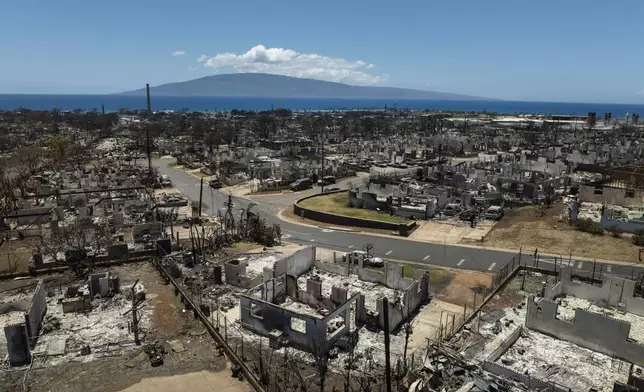 FILE - Destroyed homes are visible in the aftermath of a devastating wildfire in Lahaina, Hawaii, Tuesday, Aug. 22, 2023. (AP Photo/Jae C. Hong, File)