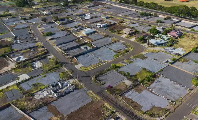 FILE - A general view of the burn zone after the completion of residential primary debris removal and the beginning of commercial debris removal, Saturday, July 6, 2024, in Lahaina, Hawaii. (AP Photo/Mengshin Lin, File)