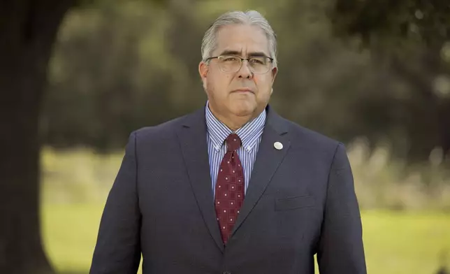 Jeff Fife, a Tvstvnvke, or warrior, for Hickory Ground and chief of staff for Principal Chief of the Muscogee Nation, poses for a photo, Aug. 21, 2024, in Okmulgee, Okla. (AP Photo/Brittany Bendabout)