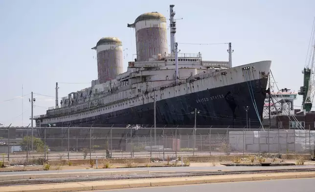 The S.S. United States is moored on the Delaware River in Philadelphia, Wednesday, Sept. 4, 2024. (AP Photo/Matt Rourke)