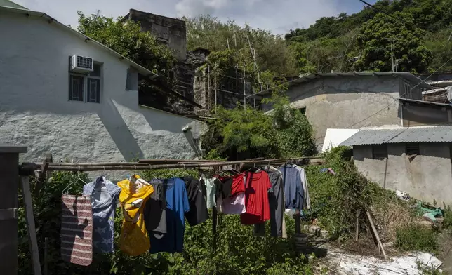 Laundry are hung to dry at the Cha Kwo Ling village in east Kowloon, Hong Kong, Sunday, Aug. 25, 2024. (AP Photo/Chan Long Hei)