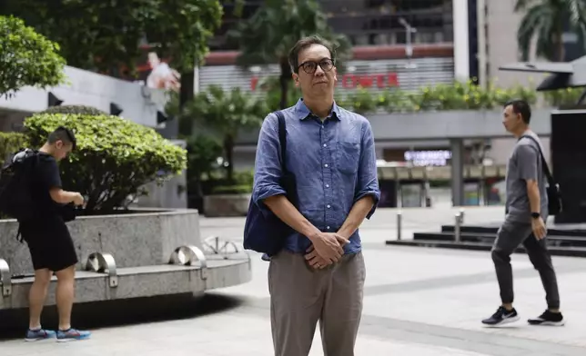 Chung Pui-kuen, the former chief editor of Hong Kong's now shuttered pro-democracy news outlet Stand News, arrives at the Wanchai District Court ahead of the final sentencing of Stand News sedition case in Wan Chai district court in Hong Kong on Thursday, Sept. 26, 2024. (AP Photo/May James)