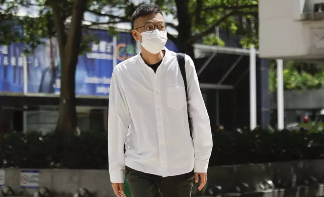 Patrick Lam, the former acting editor-in-chief of Hong Kong's now shuttered pro-democracy news outlet Stand News arrives at the District Court in Wan Chai, Hong Kong, ahead of a sentencing hearing for two former Stand News editors convicted of sedition, Thursday, Sept. 26, 2024. (AP Photo/May James)