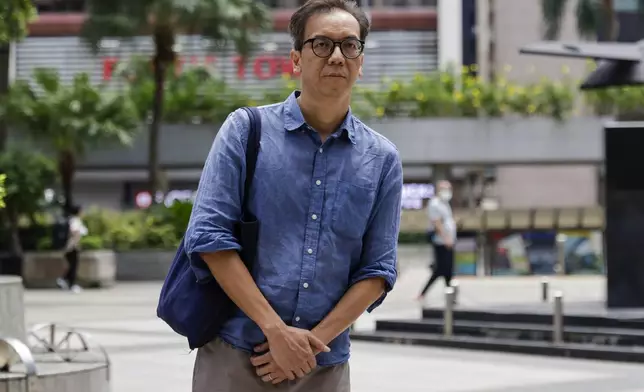 Chung Pui-kuen, the former chief editor of Hong Kong's now shuttered pro-democracy news outlet Stand News, arrives at the Wanchai District Court ahead of the final sentencing of Stand News sedition case in Wan Chai district court in Hong Kong on Thursday, Sept. 26, 2024. (AP Photo/May James)