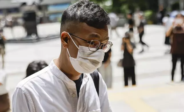 Patrick Lam, the former acting editor-in-chief of Hong Kong's now shuttered pro-democracy news outlet Stand News arrives at the District Court in Wan Chai, Hong Kong, ahead of a sentencing hearing for two former Stand News editors convicted of sedition, Thursday, Sept. 26, 2024. (AP Photo/May James)