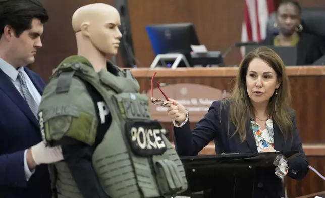 Defense attorney Nicole DeBorde Hochglaube speaks during closing arguments in the murder trial of former Houston police officer Gerald Goines in the 482nd District Court at the Harris County Criminal courthouse Tuesday, Sept. 24, 2024, in Houston. Goines faces two felony murder charges in the January 2019 deaths of Dennis Tuttle and Rhogena Nicholas. (Melissa Phillip/Houston Chronicle via AP)