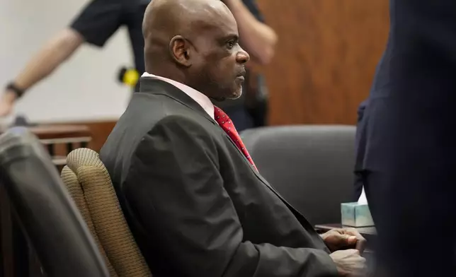 Retired Houston Police Department officer Gerald Goines is photographed during the opening statement of his two felony murder charges in the January 2019 deaths of Dennis Tuttle and Rhogena Nicholas, Monday, Sept. 9, 2024, at Harris County Criminal Courthouse in Houston. (Yi-Chin Lee/Houston Chronicle via AP)