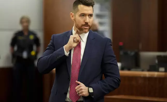 Prosecutors Keaton Forcht tells the jury that retired Houston Police Department officer Gerald Goines was one of four police officers that were shot during the Harding Street Raid as during his opening statement of the murder trial of Goines, Monday, Sept. 9, 2024, at Harris County Criminal Courthouse in Houston. Goines was on trial for two felony murder charges in the January 2019 deaths of Dennis Tuttle and Rhogena Nicholas. (Yi-Chin Lee/Houston Chronicle via AP)