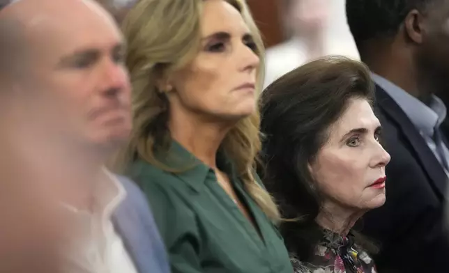 Elyse Lanier, the widow of former Houston Mayor Bob Lanier and a supporter of former Houston police officer Gerald Goines, right, is shown during closing arguments in his murder trial in the 482nd District Court at the Harris County Criminal courthouse Tuesday, Sept. 24, 2024, in Houston. Goines faces two felony murder charges in the January 2019 deaths of Dennis Tuttle and Rhogena Nicholas. (Melissa Phillip/Houston Chronicle via AP)