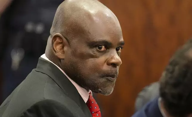 Retired Houston Police Department officer Gerald Goines looks on during the opening statement of his two felony murder charges in the January 2019 deaths of Dennis Tuttle and Rhogena Nicholas, Monday, Sept. 9, 2024, at Harris County Criminal Courthouse in Houston. (Yi-Chin Lee/Houston Chronicle via AP)