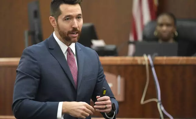 Prosecutor Keaton Forcht speaks during closing arguments in the trial of former Houston police officer Gerald Goines in the 482nd District Court at the Harris County Criminal courthouse Tuesday, Sept. 24, 2024, in Houston. Goines faces two felony murder charges in the January 2019 deaths of Dennis Tuttle and Rhogena Nicholas. (Melissa Phillip/Houston Chronicle via AP)