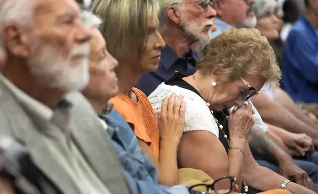 Patricia Nicholas, sister-in-law of Rhogena Nicholas, wipes her tears during the closing arguments in the murder trial of former Houston police officer Gerald Goines in the 482nd District Court at the Harris County Criminal courthouse Tuesday, Sept. 24, 2024, in Houston. Goines faces two felony murder charges in the January 2019 deaths of Dennis Tuttle and Rhogena Nicholas. (Melissa Phillip/Houston Chronicle via AP)