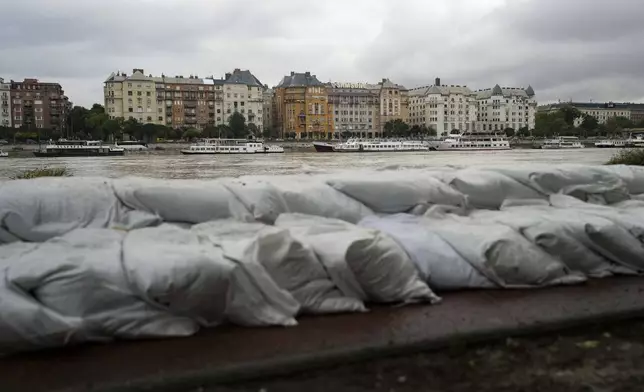 A dam is built to protect Margaret Island in Budapest, Hungary, due to the flooding of the Danube river on Monday, Sept. 16, 2024. (AP Photo/Denes Erdos)