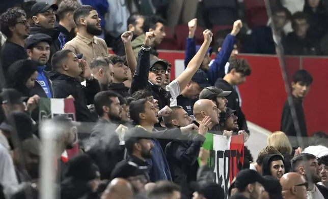 Italy's fans cheer their team during the UEFA Nations League soccer match between Israel and Italy, at Bozsik Arena, in Budapest, Hungary, Monday, Sept. 9, 2024. (AP Photo/Denes Erdos)