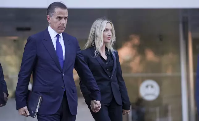 Hunter Biden and his wife Melissa Cohen Biden leaves federal court, Thursday, Sept. 5, 2024, in Los Angeles, after he pled guilty to federal tax charges. (AP Photo/Eric Thayer)