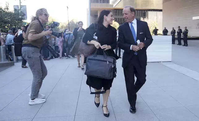 Abbe Lowell, right, an attorney for Hunter Biden, leaves federal court after Biden pled guilty to federal tax charges, Thursday, Sept. 5, 2024, in Los Angeles. (AP Photo/Eric Thayer)