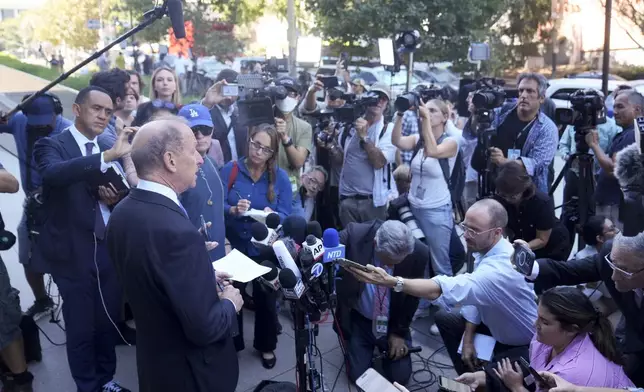 Abbe Lowell, left, an attorney for Hunter Biden, makes a statement after Biden pled guilty to federal tax charges, Thursday, Sept. 5, 2024, in Los Angeles. (AP Photo/Eric Thayer)