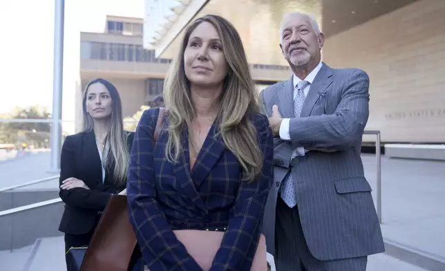 Members of Hunter Biden's defense team stand outside federal court after Biden pleaded guilty in his felony federal tax case, Thursday, Sept. 5, 2024, in Los Angeles. (AP Photo/Eric Thayer)