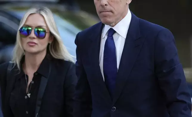 Hunter Biden, right, and his wife Melissa Cohen Biden, arrive in federal court for jury selection for his trial on felony tax charges Thursday, Sept. 5, 2024, in Los Angeles. (AP Photo/Jae C. Hong)