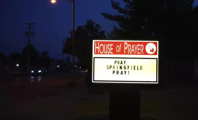 A church sign is seen at House of Prayer near the First Haitian Church and community center in Springfield, Ohio, Saturday, Sept. 14, 2024. (AP Photo/Luis Andres Henao)